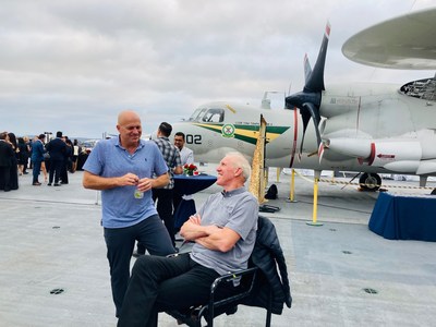 Bill Walton with Stellar Solar Kent Harle on the deck of the USS Midway before speaking to San Diego business leaders on his role as their solar evangelist at the San Diego Union Tribune Best Of awards.