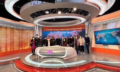 PR & Communications professionals visited Hong Kong's Television Broadcasts Limited (TVB) news studio as part of a PR Newswire media tour in December 2021. (PRNewsfoto/PR NEWSWIRE)