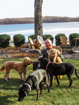 Bill Partyka, Kradle's new Chief Executive Officer, pictured above with his dogs.