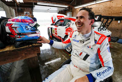 Robert Wickens is all smiles after driving the Hyundai Veloster N TCR at Mid-Ohio Sports Car Course in Lexington, Ohio on May 4, 2021.
