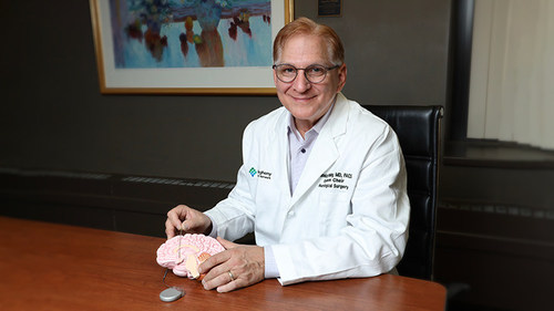 Dr. Donald Whiting demonstrates location in the brain for deep brain stimulation.