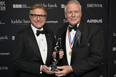 CAE’s President and Chief Executive Officer, Marc Parent, received the Living Legends of Aviation's highest award, the Industry Leader of the Year Award. Marc Parent (left), is presented with the award by Pete Bunce, President and CEO of the General Aviation Manufacturer’s Association (GAMA). Photo Credit: 2022 Living Legends of Aviation (CNW Group/CAE INC.)