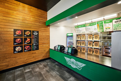 Entrance of Wingstop's “restaurant of the future” - a digitally-focused prototype restaurant - designed around the carryout guest and delivery driver.