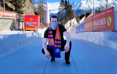 USA Luge team member Johnny Gustafson sports a specially designed winter scarf given by White Castle, one of USA Luge's official sponsors.