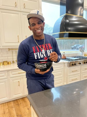 Football Hall of Famer Deion “Coach Prime” Sanders gets in his favorite protein-packed morning snack, Oikos Triple Zero, using the limited-edition Oikos® Strong Bowl that doubles as a 15lb weight, just in time for Game Day.