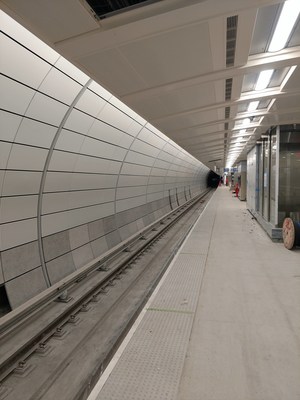 Metalwerks provided customized cladding for the expansion of Grand Central Station, including a support and panel attachment system that sits only three inches from the face of the tunnel to keep the system depth low in the tight space. The panels are used as a screen wall covering the concrete surface of curved walls where trains enter the platforms for passenger unloading and loading.