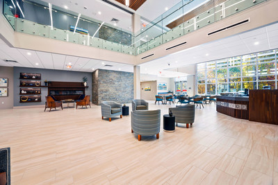 A view of the main lobby at Parker at Somerset, with the Cypress Cafe and outdoor terrace shown on the right.