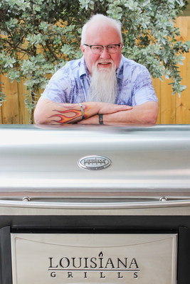 Louisiana Grills signs partnership agreement with Dr. BBQ Ray Lampe.