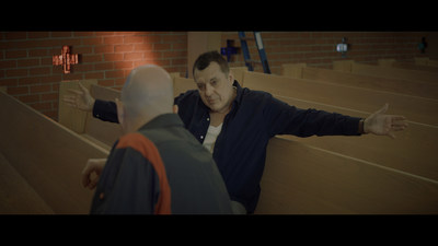 Jace (Tom Sizemore) discusses the fine points of religion.