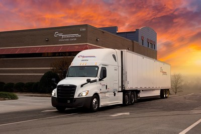 Cargo Transporters tractor and trailer.  Cargo Transporters Claremont Operations Center in background