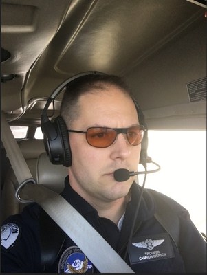 Flight Officer Camron Iverson of the Washington State Patrol tested CALI laser protective lenses formulated at Air Force Research Laboratorys Materials and Manufacturing Directorate. (AFRL courtesy photo)