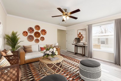 The entry way and living room of a manufactured home.