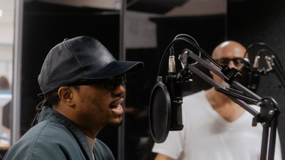 Darrius Turner and Jody Aguirre working in the recording studio in the Limon Correctional Facility.