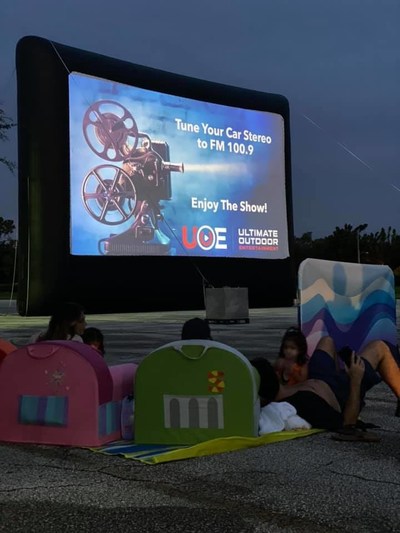 A family finds the perfect spot for their outdoor movie night at Sea World Orlando