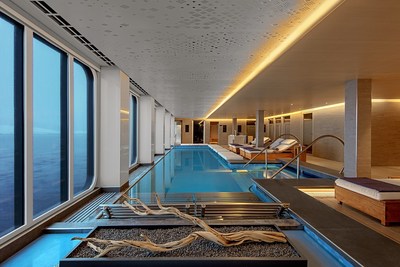 The Nordic Spa on board Viking’s expedition ships offers guests opportunities to experience the ultimate healthy Nordic traditions, with an indoor heated pool set against expansive windows, pictured here, and a badestamp (wood-sided hot tub) that is open to the outside. For more information, visit www.viking.com.