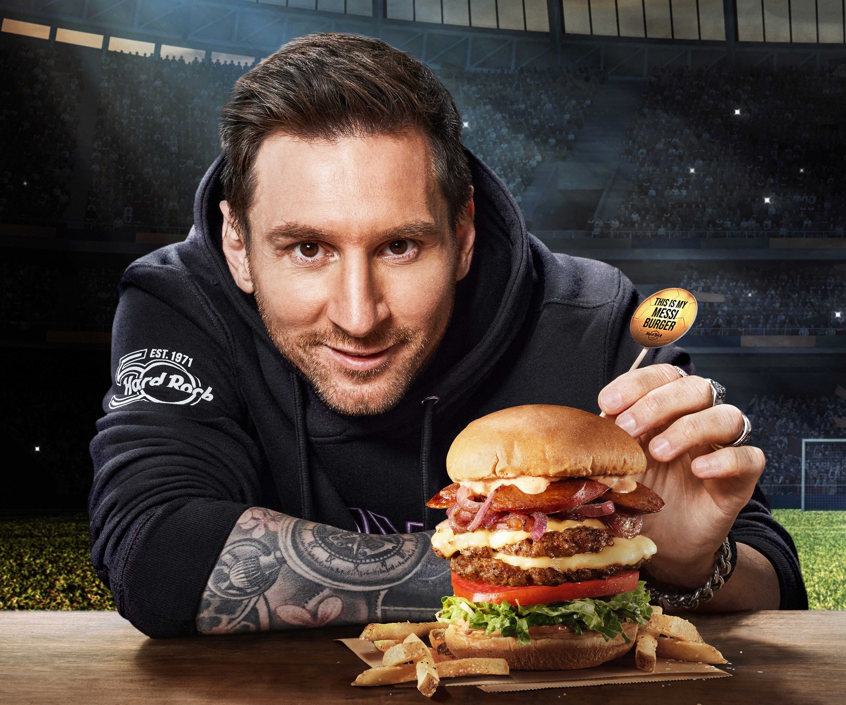 Leo Messi with Hard Rock Cafe Messi Burger
