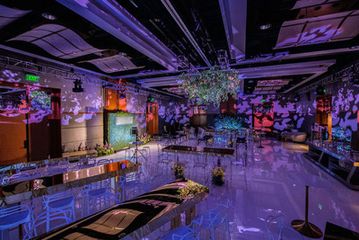 "Wildflower Welcome" Best Decor/Design - UV's event design included a hanging floral installation, floral walls, photo backdrops surrounded by "growing" florals at the base of each wall, a custom branded neon logo, mirrored furniture to reflect the florals from every angle, and beautiful gold and white furniture groupings to tie the entire room together.