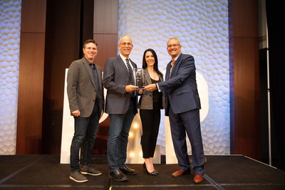 NAMI CEO Daniel H. Gillison Jr. (far right) and Kelly Russo, NAMI Director of Field Resource Development (next on right) are honored to accept the Peer-to-Peer (P2P) Professional Forum Organization of the Year Award from P2P Professional Forum President David Hessekiel (third from right) and Matt Glass, Eventage Partner and Chief Creative Officer (far left). Photo credit: Keith White