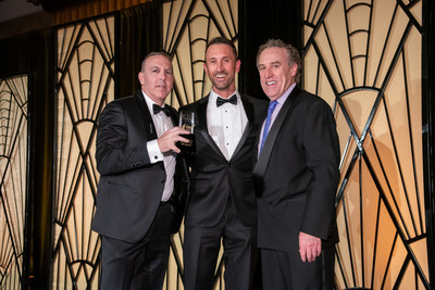 Everi’s Dean Ehrlich (left) and David Lucchese (right) accept the award for “Most Improved Supplier – Core”