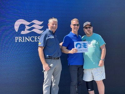 (Left to right) Tom Gorsuch (President of the Porsche Club of America) and John Padgett (Princess Cruises president) congratulate Chili Winters winner of Porsche Club of America’s WERKS Reunion Classic Club Coupe Division with a 7-night Princess MedallionClass vacation. Princess is now the official vacation partner of PCA’s national events.