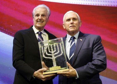 Dr. Mike Evans, FOZ Founder and former Vice President Mike Pence with The Friends of Zion Award. Photo: Yosi Zamir (PRNewsfoto/Friends of Zion)