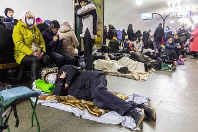 Internally displaced Ukrainians sheltering in a subway station during a Russian rocket and bomb attack.