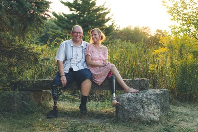 Tom Carlson (Left) poses with his wife, Kim, in suburban Chicago. Finding support after amputation was a big missing piece of Carlson's experience, and he vowed to help others with their journey.