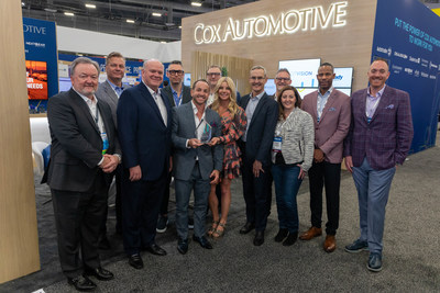 Cox Automotive President Steve Rowley (second from left) with Ryan LaFontaine (third from left), CEO of Lafontaine Automotive Group, and Kelley LaFontaine (fourth from left), vice president, LaFontaine Automotive Group, at NADA Show 2022 in Las Vegas. LaFontaine Automotive Group was presented the 2022 Cox Automotive Leader in Sustainability Award on Friday, March 11.