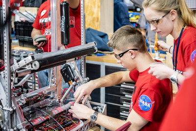 NASA-sponsored students work on their robots during the 2019 competition at the Wolstein Center. Credit: NASA