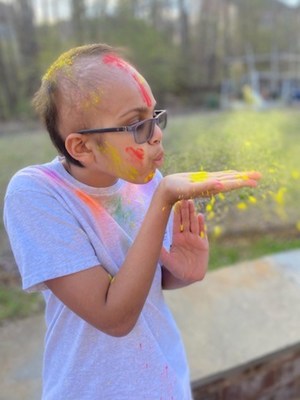 St. Jude patient Avyan, celebrates Holi.