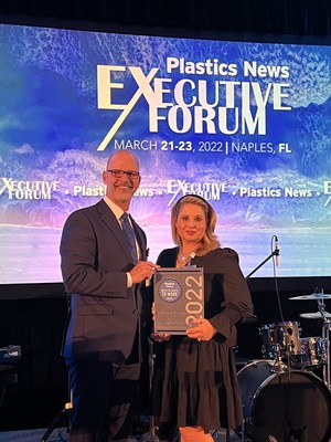Dan Holloway, PureCycle’s vice president of human resources and administration and Brandwyn "Bee" Frye, PureCycle’s human resources manager accept the Best Places to Work award from Plastics News on behalf of all the PureCycle team