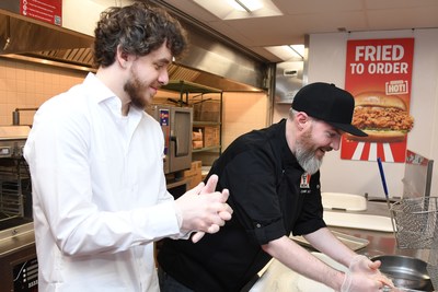 Jack Harlow learned how to bread and fry KFC’s world-famous fried chicken in the test kitchen with KFC Head Chef, Chris Scott.