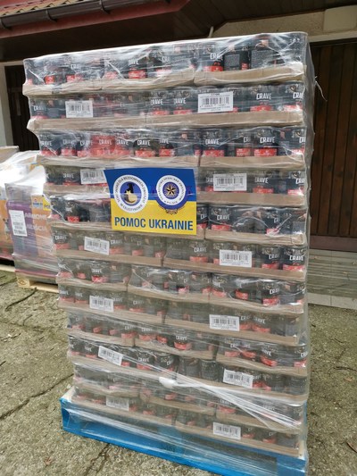 Helen Woodward Animal Center's Ukraine Animal Crisis Fund is providing financial assistance to animal welfare workers who administer medication and supply food, bedding and more to the pets of Ukrainian refugees and Ukrainian shelter pets.  Here, a pallet of dog food arrives to help Ukrainian canines in need.