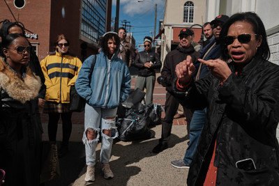 Dr. Andrea Douglas leads a walking tour, highlighting points of interest along the historic pedestrian Downtown Mall, Court Square, and Vinegar Hill neighborhood in Charlottesville.