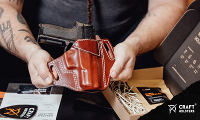 A custom leather OWB holster and packaging by Craft Holsters