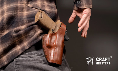 A custom leather OWB holster for pistols with red dot sights by Craft Holsters