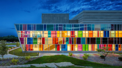 A kaleidoscopic west curtain wall evokes ribbons earned for acts of valor. Copyright LEO A DALY and McCarthy Building Companies. Photography by A.J. Brown Imaging