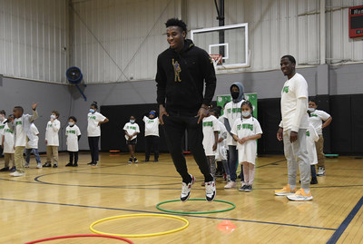 Celtics guard-forward Aaron Nesmith shows his jumping skills at Dorchester YMCA.