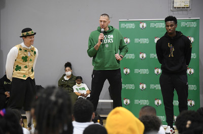 Celtics players Daniel Theis and Aaron Nesmith, along with Lucky the Leprechaun, talk fitness and healthy habits with kids at Dorchester YMCA for annual Sun Life Fit to Win program.