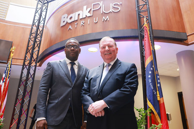 Jackson State University President Thomas K. Hudson, J.D., and BankPlus President and CEO William A. Ray pose in front of the newly unveiled BankPlus Atrium signage at the College of Business on Tuesday.