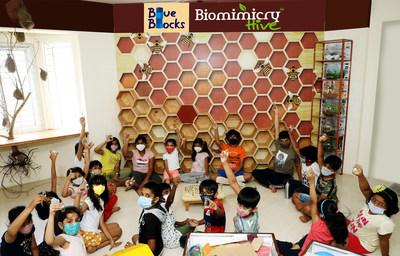 Biomimicry Hive buzzing - children showcasing their seeds