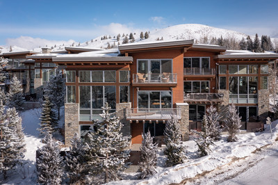 The light-drenched home allows owners to take in the fresh mountain air from two decks, one off the dining room and another off the primary suite. Additional features of the spacious three-story home include a gourmet kitchen, three guest bedrooms, an office, a game room, an elevator and a private two-car garage.