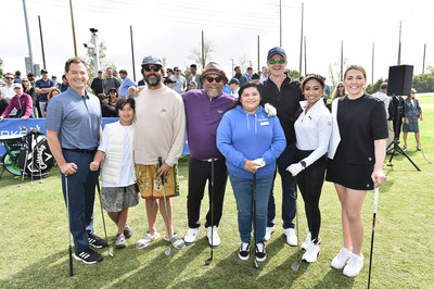 From left, Mayor of El Segundo Drew Boyles, Luciano Malbon, golf trendsetter Stephen Malbon, actor and comedian George Lopez, Make-A-Wish representative Joanna Rodriguez, Topgolf CEO Artie Starrs, lifestyle and golf influencer Tisha Alyn, and golf personality Hally Leadbetter participates in a ceremonial first tee event on Monday, April 11, 2022, celebrating the upcoming opening of Topgolf’s newest venue and refurbished golf course at The Lakes at El Segundo. Proceeds from the ceremonial swings benefited the local Los Angeles Make-A-Wish® Chapter. Topgolf donated $20,000 to grant a child’s wish in the greater Los Angeles area. (Jordan Strauss/AP Images for Topgolf)