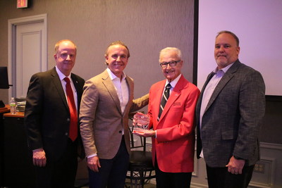 Jet Linx's President & CEO Jamie Walker and Senior Vice President of Integrations Jason Vanis accept the Bill Shea Award by William F. Shea on behalf of Jet Linx.