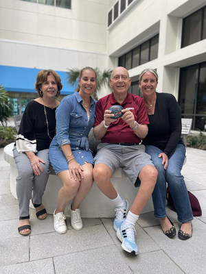 At his chemo completion ceremony, Dick Vitale shared his love for his family, his oncology team, and the many friends and fans who have supported him with daily tweets, messages and prayers. Holding the river rock his oncology team painted and presented to him, he is pictured here with wife Lorraine and daughters Terri (left of Dick) and Sherri (right of Dick).
