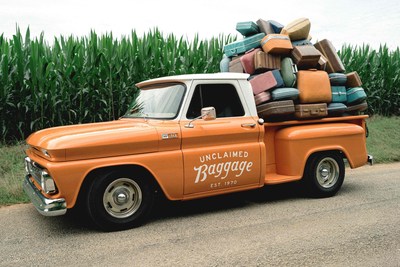 The original 1965 Chevy truck that carried the first load of unclaimed bags in 1970 hits the road the celebrate 50 years.