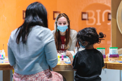 Stanford scientist Alyssa Lyn Fortier conducts Draw with DNA with a family at The Tech Interactive in San Jose, CA. The genetics activity is part of the Stanford at The Tech program. Stanford scientists also make genetics more approachable by answering questions from the public through the newly revamped Ask a Geneticist website: www.thetech.org/ask-a-geneticist