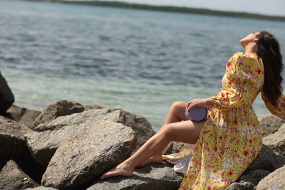 Mariana Cantu in dress by Concepción Miranda and Malau handbag