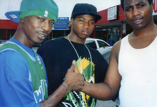 From 2002, a young Gucci Mane (right) shakes hands with 4-Tre (left) in the early days of the S.Y.S. rap group.