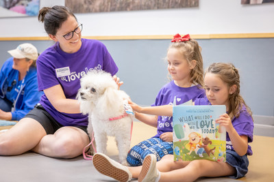 Kids at San Diego Humane Society read Kristin Chenoweth's new book to pets.